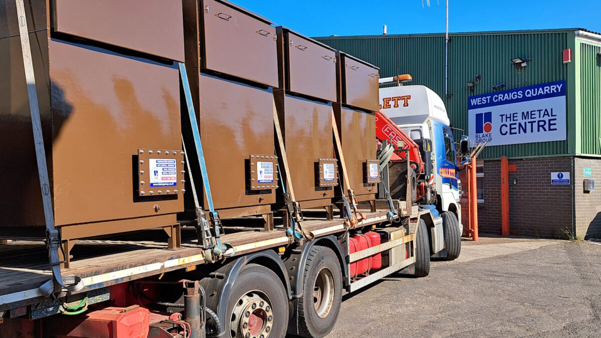 New tanks manufactured by Blake Group on a lorry being transported to the RAF in England.