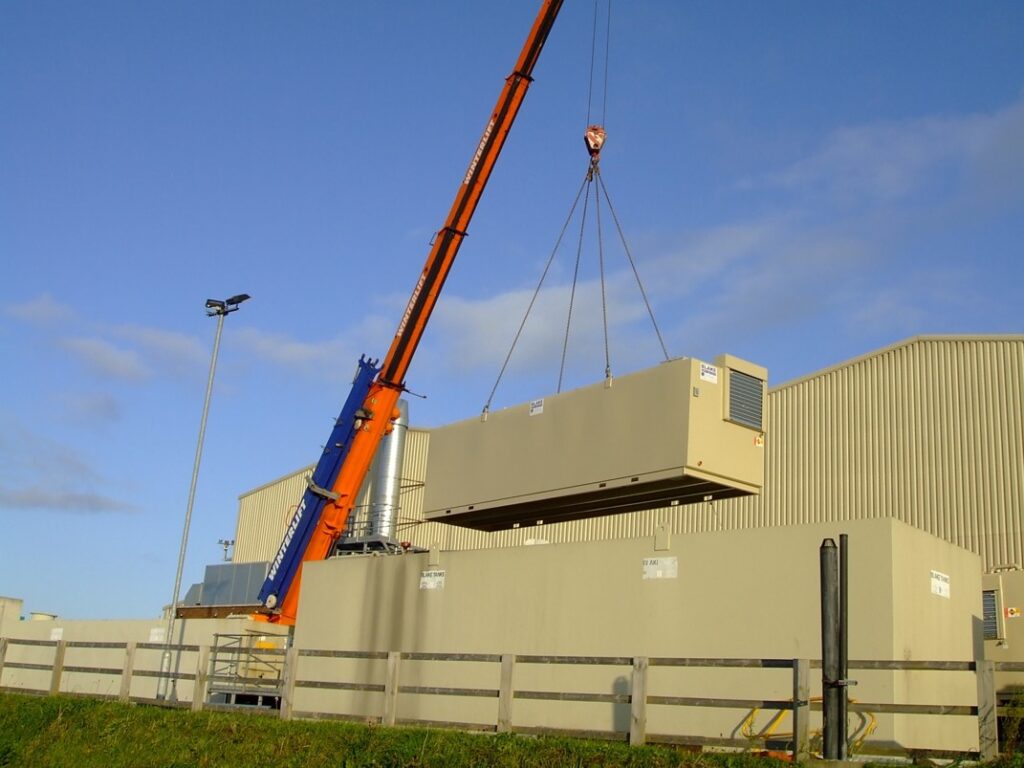 Rectangular fuel tank made by Blake Group in Edinburgh being craned into location