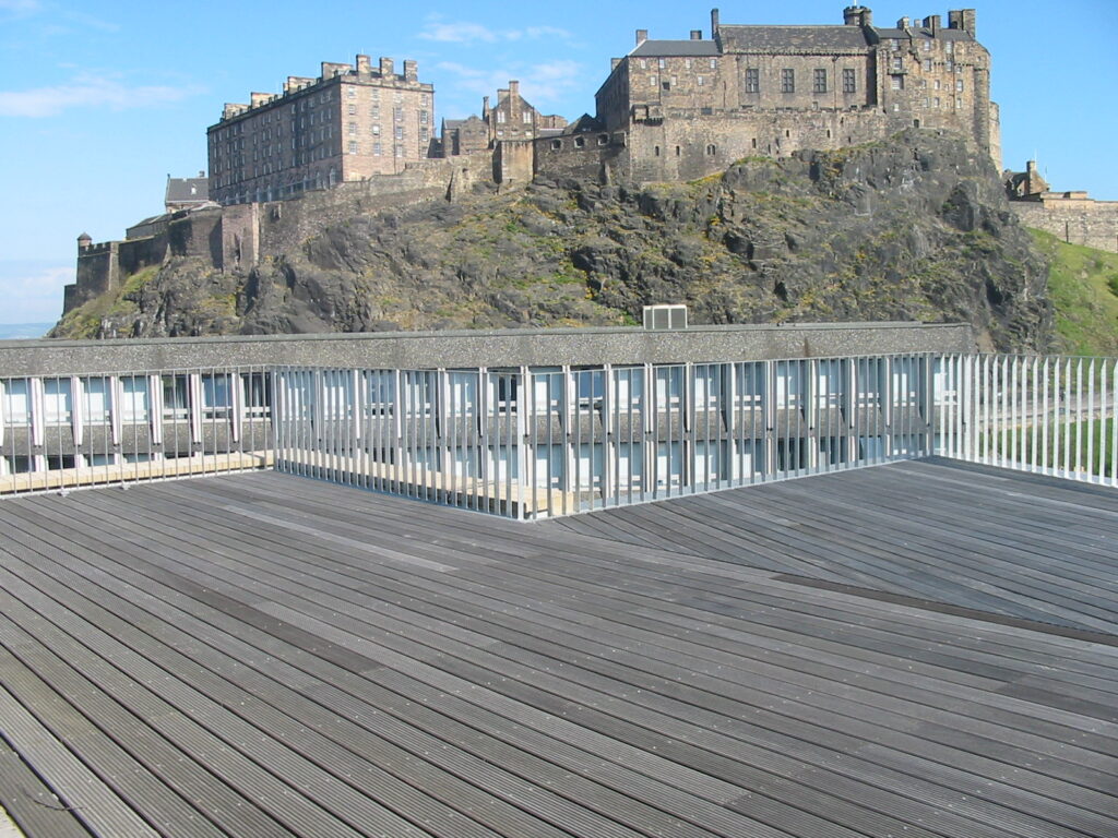 Steel railings and balustrades on exterior of Edinburgh College of Art by Blake Group looking over to Edinburgh Castle