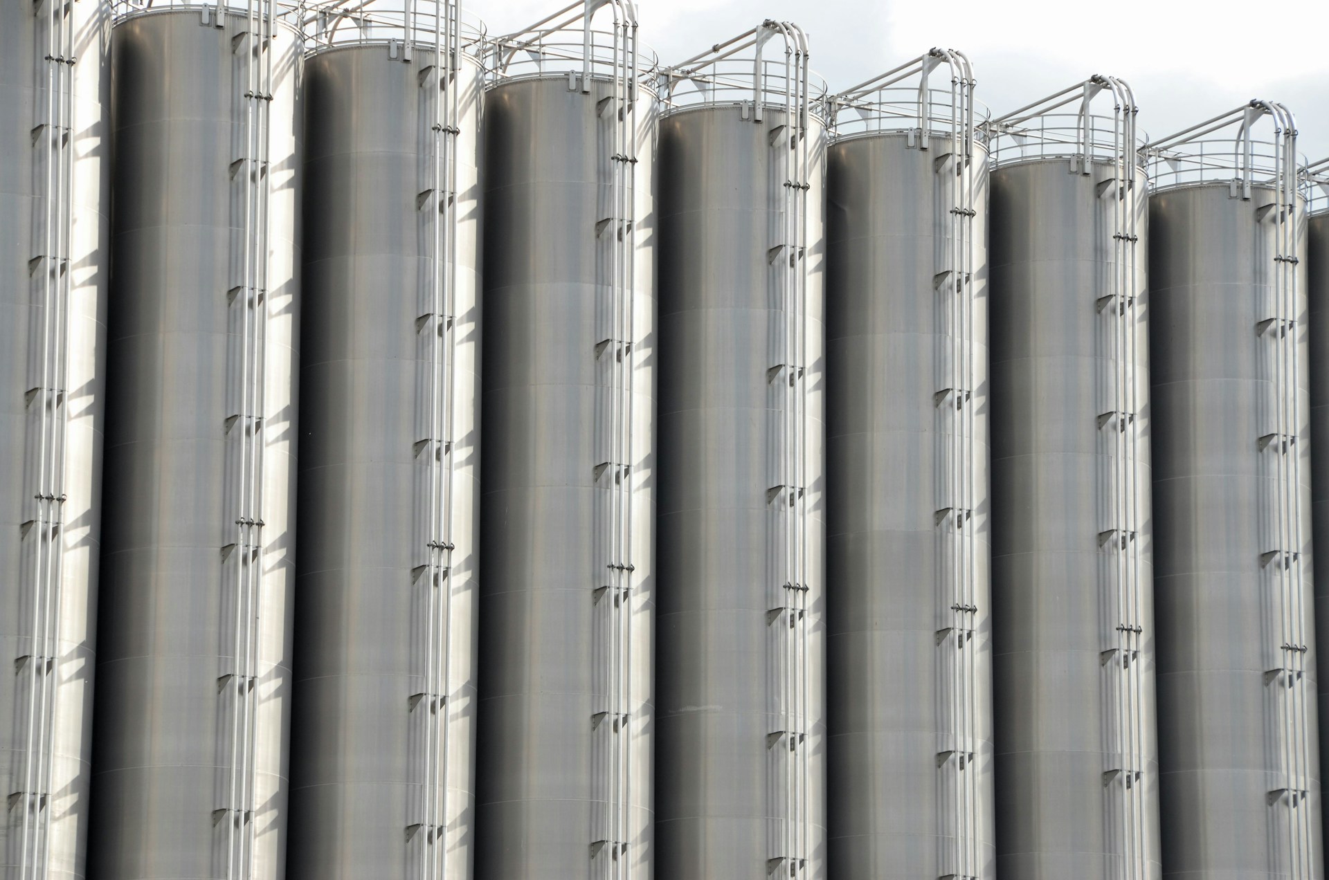 8 tall cylindrical tanks