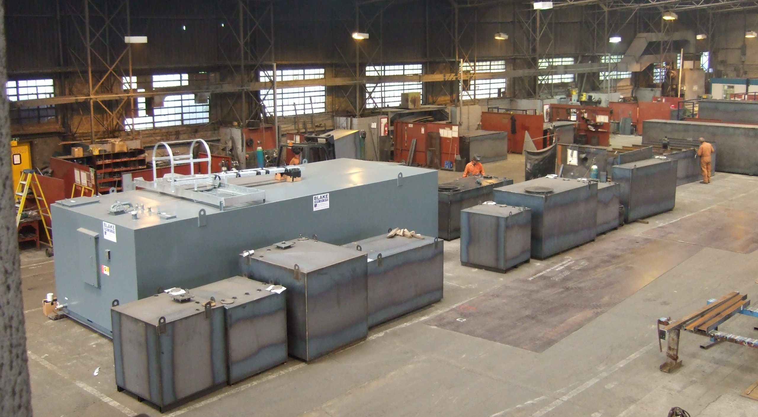 Internal view of the Blake Group factory with metal storage tanks being made.