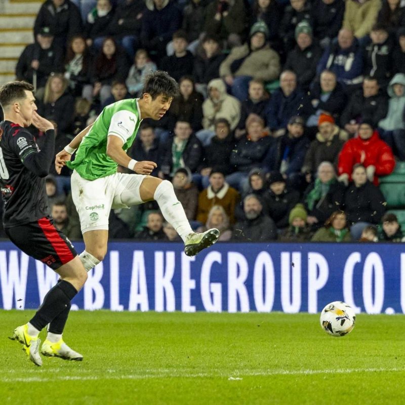 Hibs v Clydebank at Hibernian FC with Blake Group advertising in the background